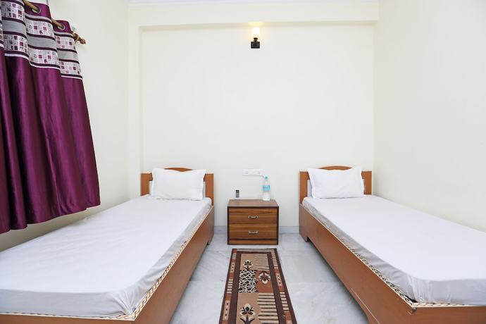Imagen de la habitación del Hotel OYO 44618 Paradise Guest House. Foto 4