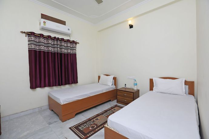 Imagen de la habitación del Hotel OYO 44618 Paradise Guest House. Foto 8