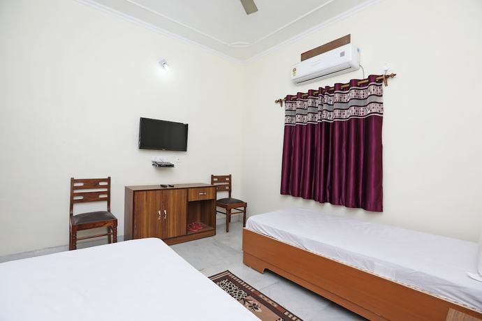 Imagen de la habitación del Hotel OYO 44618 Paradise Guest House. Foto 9