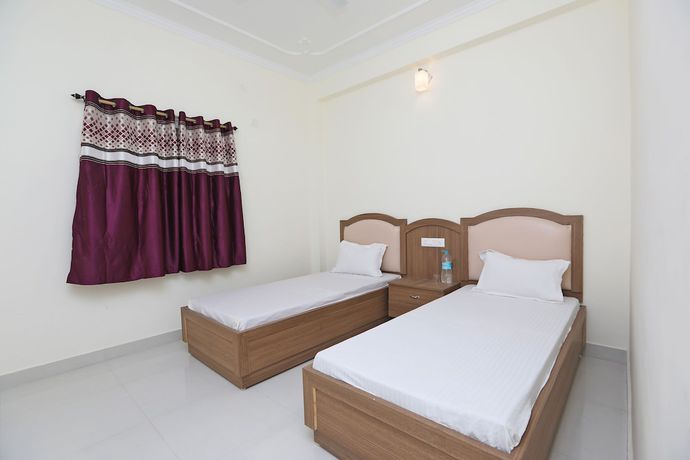 Imagen de la habitación del Hotel OYO 44618 Paradise Guest House. Foto 11