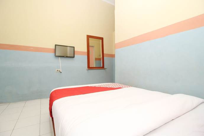 Imagen de la habitación del Hotel OYO 451 Divka Residence Syariah. Foto 9