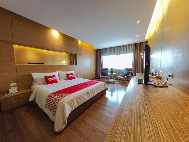 Imagen de la habitación del Hotel OYO 456 Nipa Garden Hotel. Foto 11