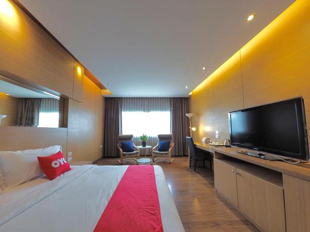 Imagen de la habitación del Hotel OYO 456 Nipa Garden Hotel. Foto 12