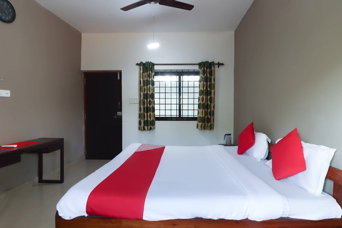 Imagen de la habitación del Hotel OYO 47481 Mantra Guest Line. Foto 7