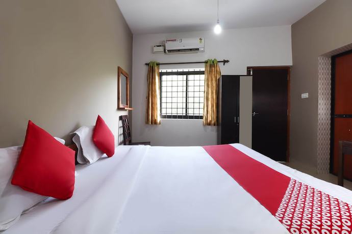 Imagen de la habitación del Hotel OYO 47481 Mantra Guest Line. Foto 8