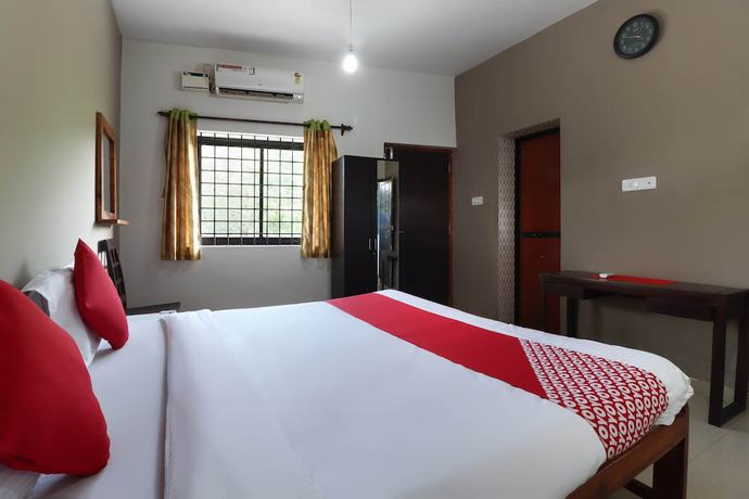 Imagen de la habitación del Hotel OYO 47481 Mantra Guest Line. Foto 9