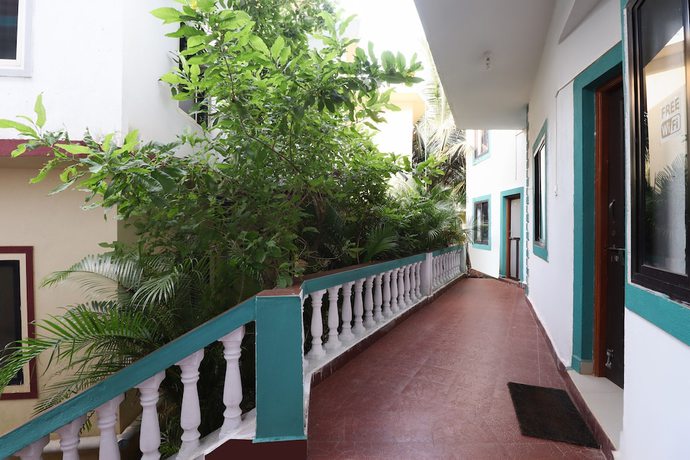 Imagen de la habitación del Hotel OYO 47481 Mantra Guest Line. Foto 10