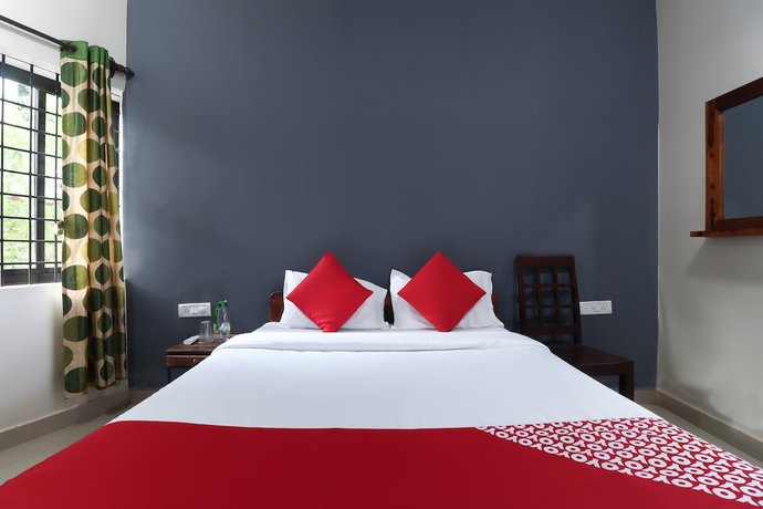 Imagen de la habitación del Hotel OYO 47481 Mantra Guest Line. Foto 11