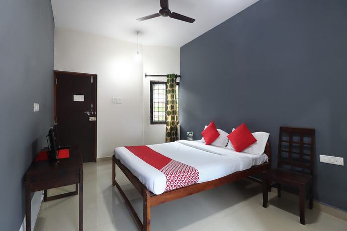 Imagen de la habitación del Hotel OYO 47481 Mantra Guest Line. Foto 12