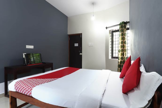 Imagen de la habitación del Hotel OYO 47481 Mantra Guest Line. Foto 13