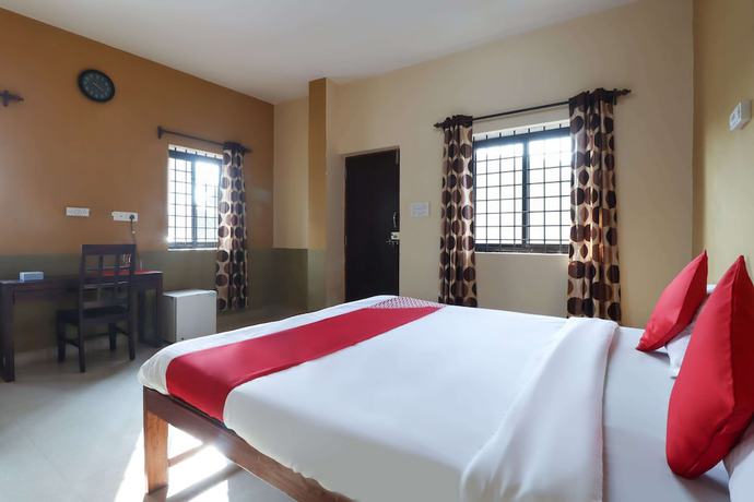 Imagen de la habitación del Hotel OYO 47481 Mantra Guest Line. Foto 14