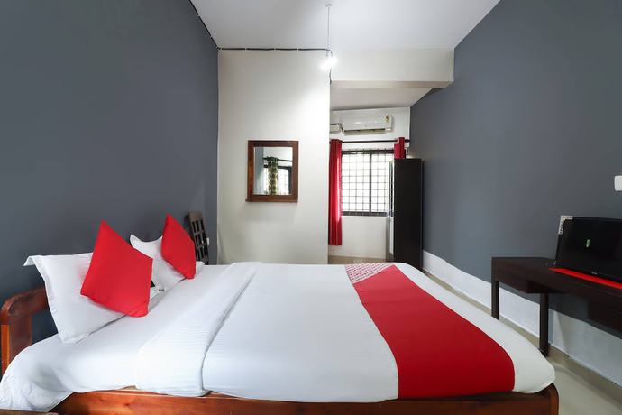 Imagen de la habitación del Hotel OYO 47481 Mantra Guest Line. Foto 16