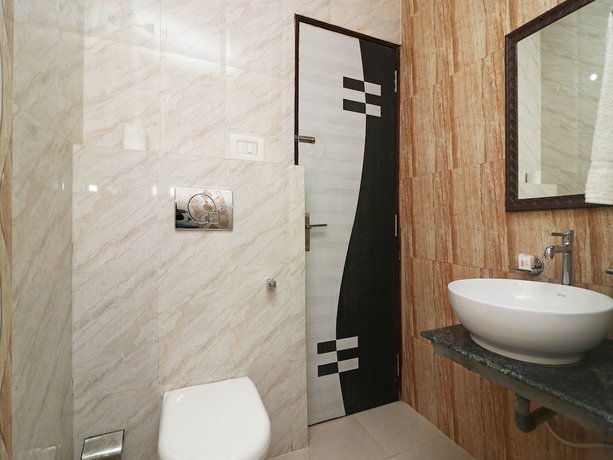 Imagen de la habitación del Hotel OYO 4773 Atithi Inn. Foto 16