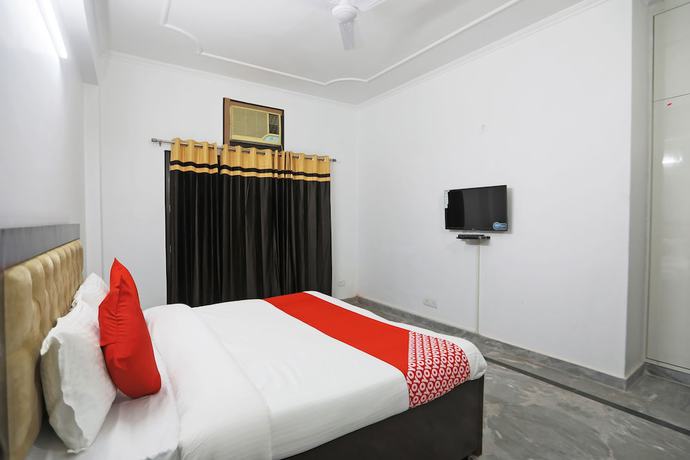 Imagen de la habitación del Hotel OYO 48900 Grand and Epic Inn. Foto 5