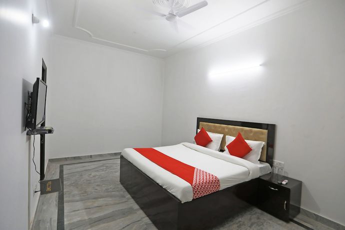 Imagen de la habitación del Hotel OYO 48900 Grand and Epic Inn. Foto 6