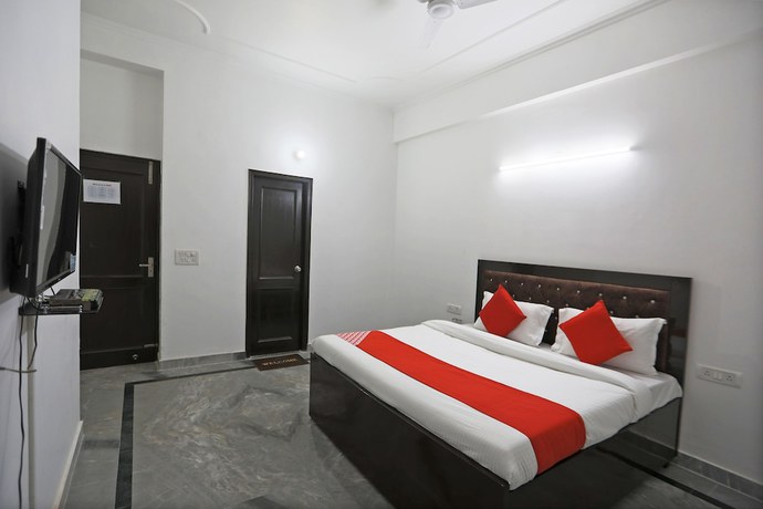 Imagen de la habitación del Hotel OYO 48900 Grand and Epic Inn. Foto 7