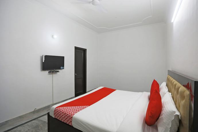 Imagen de la habitación del Hotel OYO 48900 Grand and Epic Inn. Foto 10