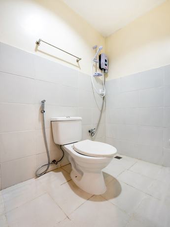 Imagen de la habitación del Hotel OYO 490 V-cat Apartelle. Foto 13