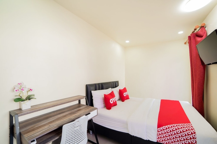 Imagen de la habitación del Hotel OYO 491 5 Diamond. Foto 2