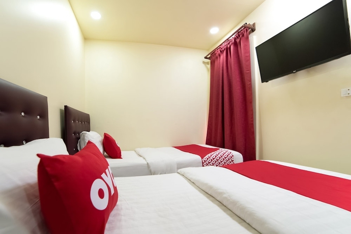 Imagen de la habitación del Hotel OYO 491 5 Diamond. Foto 5