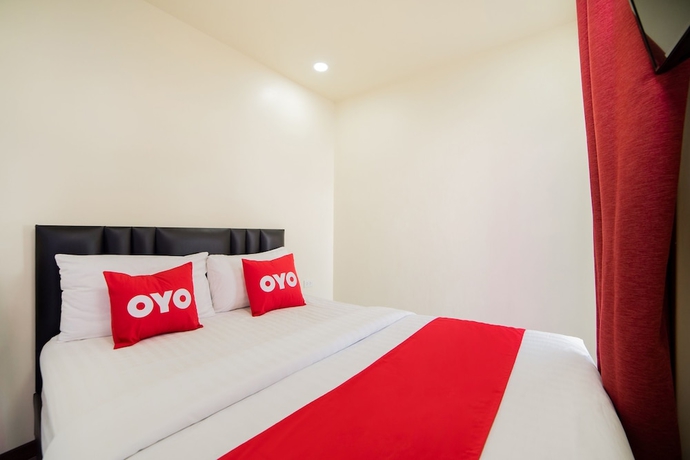 Imagen de la habitación del Hotel OYO 491 5 Diamond. Foto 7