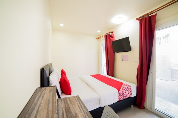 Imagen de la habitación del Hotel OYO 491 5 Diamond. Foto 8