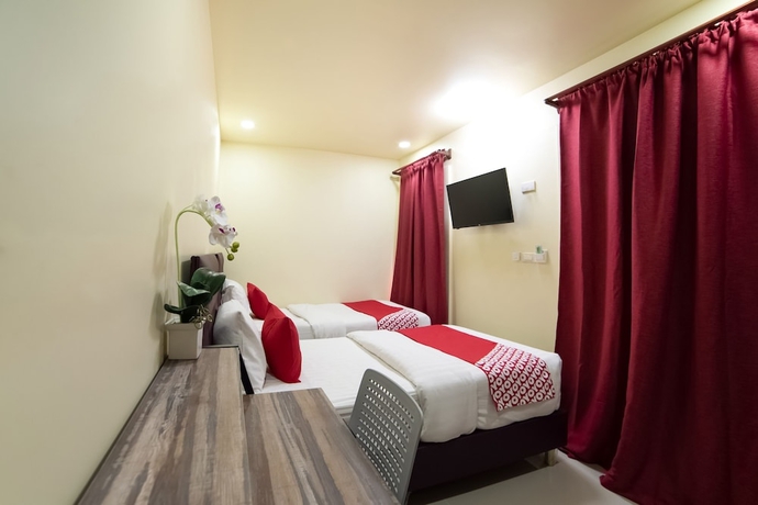 Imagen de la habitación del Hotel OYO 491 5 Diamond. Foto 14