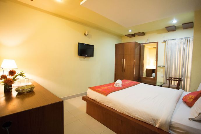 Imagen de la habitación del Hotel OYO 491 Apartment Namo Suites. Foto 4