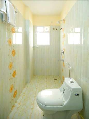 Imagen de la habitación del Hotel OYO 491 Apartment Namo Suites. Foto 6