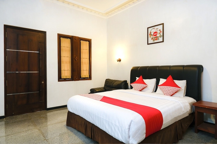 Imagen de la habitación del Hotel OYO 514 Omah Pari Boutique Hotel. Foto 3