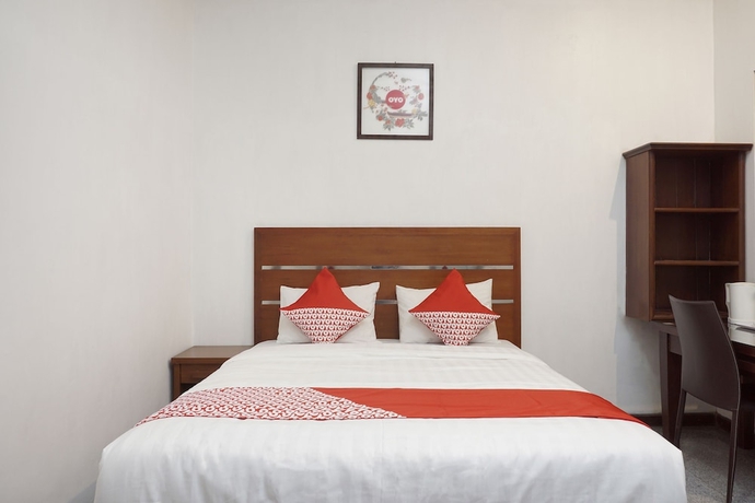 Imagen de la habitación del Hotel OYO 514 Omah Pari Boutique Hotel. Foto 6