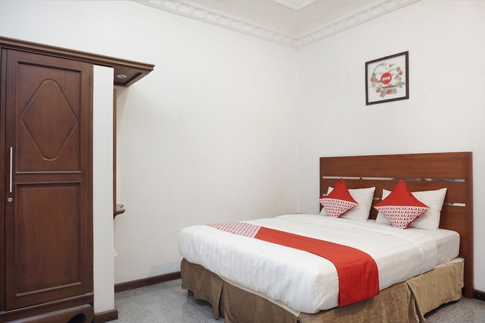Imagen de la habitación del Hotel OYO 514 Omah Pari Boutique Hotel. Foto 8