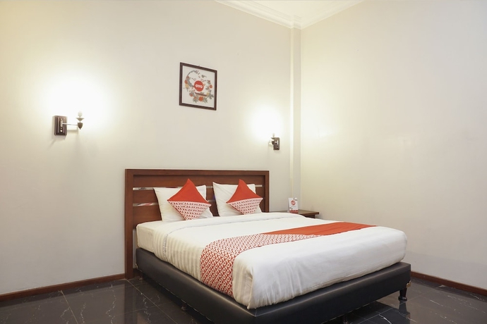 Imagen de la habitación del Hotel OYO 514 Omah Pari Boutique Hotel. Foto 10