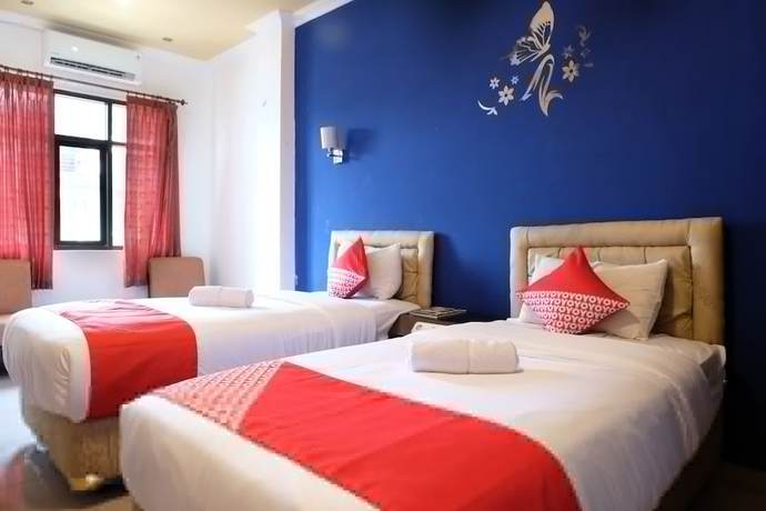 Imagen de la habitación del Hotel OYO 515 Oasis. Foto 6