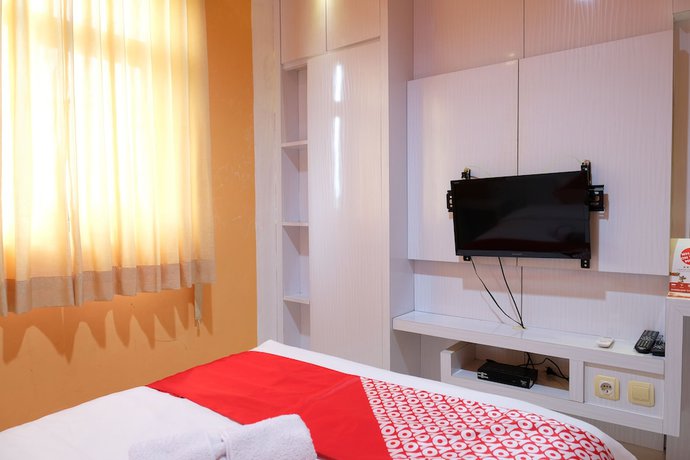 Imagen de la habitación del Hotel OYO 515 Oasis. Foto 11