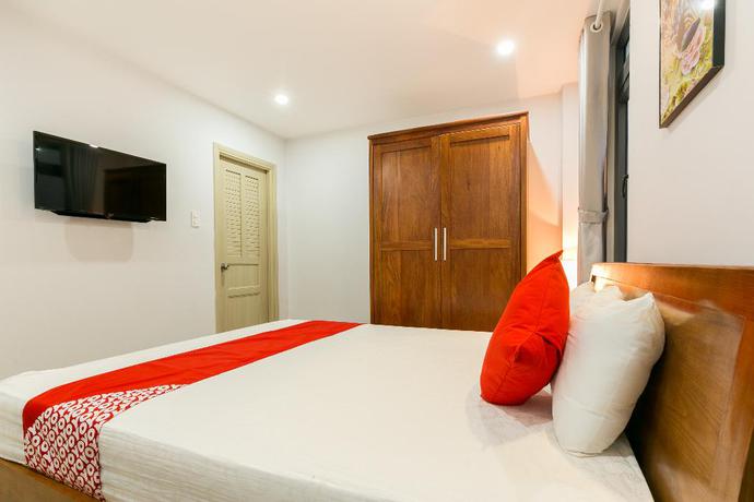 Imagen de la habitación del Hotel OYO 520 Friendly Homestay. Foto 5