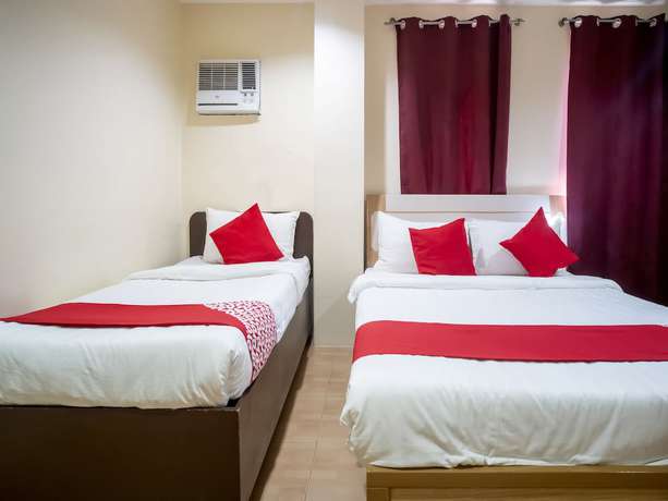 Imagen de la habitación del Hotel OYO 525 Mlin Dormitel. Foto 5