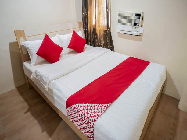 Imagen de la habitación del Hotel OYO 525 Mlin Dormitel. Foto 10