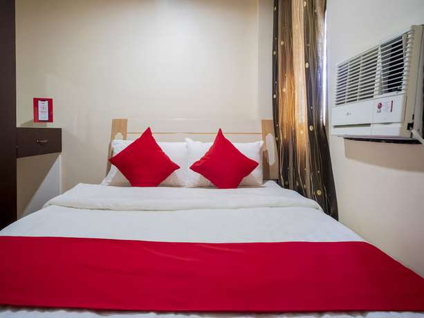Imagen de la habitación del Hotel OYO 525 Mlin Dormitel. Foto 11