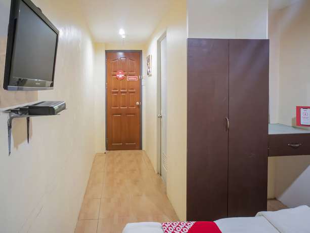 Imagen de la habitación del Hotel OYO 525 Mlin Dormitel. Foto 12