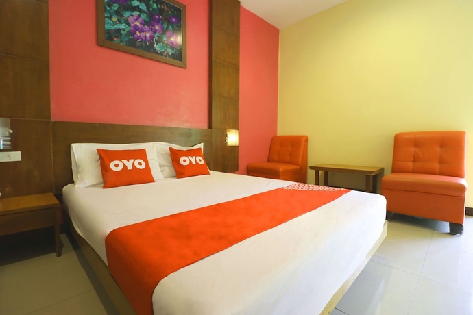 Imagen de la habitación del Hotel OYO 547 Happy Home. Foto 10