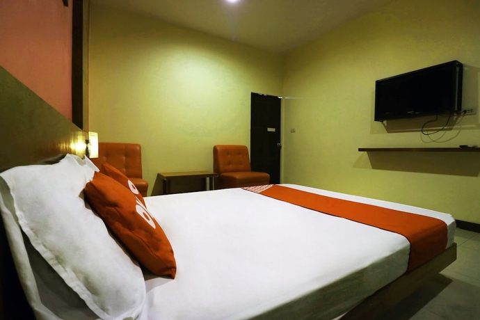 Imagen de la habitación del Hotel OYO 547 Happy Home. Foto 11
