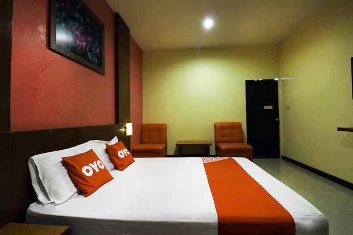 Imagen de la habitación del Hotel OYO 547 Happy Home. Foto 13