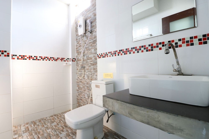 Imagen de la habitación del Hotel OYO 547 Happy Home. Foto 16