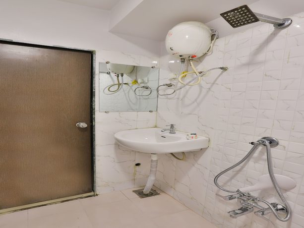 Imagen de la habitación del Hotel OYO 5476 Sunrise. Foto 12