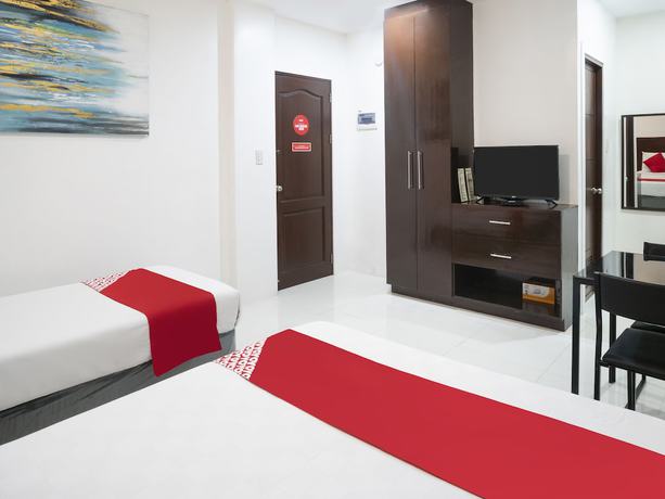 Imagen de la habitación del Hotel OYO 548 Braveheart Residency. Foto 3