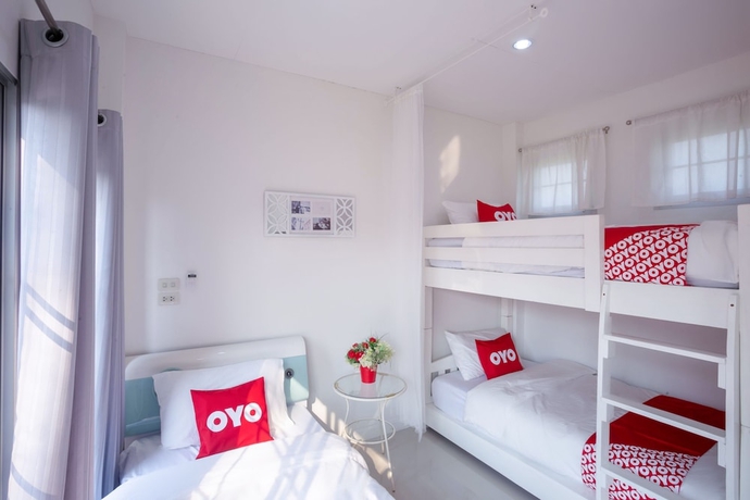 Imagen de la habitación del Hotel OYO 556 Chaisathan Cottage. Foto 2