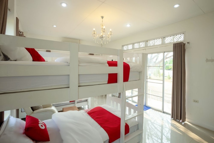 Imagen de la habitación del Hotel OYO 556 Chaisathan Cottage. Foto 5