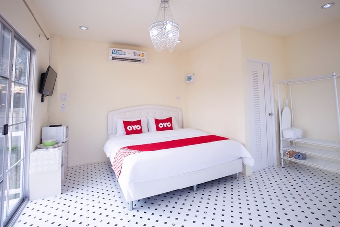Imagen de la habitación del Hotel OYO 556 Chaisathan Cottage. Foto 6
