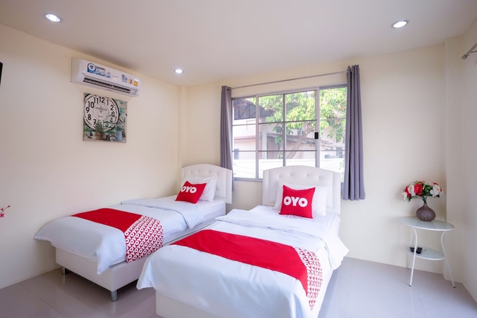 Imagen de la habitación del Hotel OYO 556 Chaisathan Cottage. Foto 8
